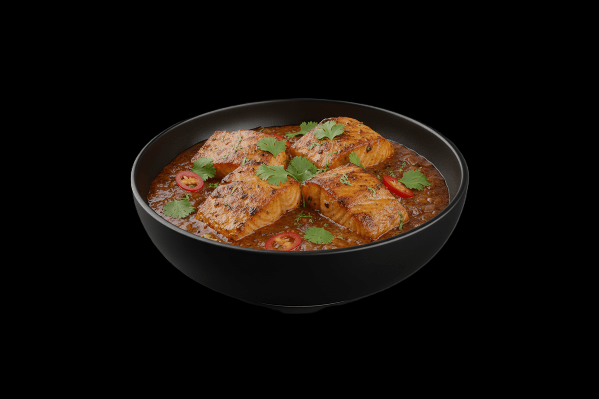 Salmon Lebu Kalia — A favorite of the Bengalis. Kalia sauce has a very flavoursome taste; the colour is from ripe vine tomato