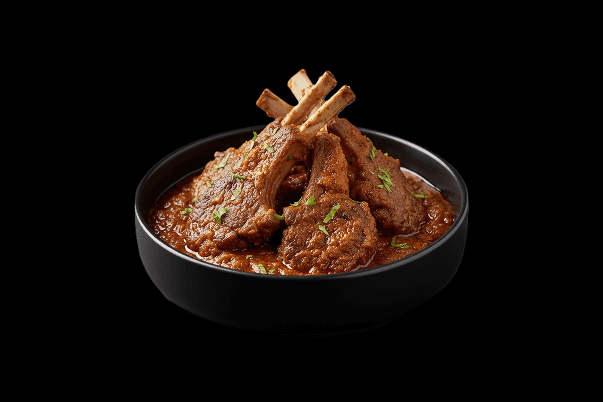 Lamb Chop Bhuna — Tender lamb chops cooked in a medium dry sauce, garnished with green peppers, GB Canteen Bushey