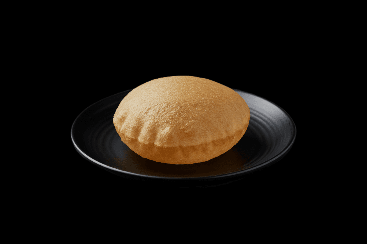 Puri — A dinky, deep-fried puffed disk of unleavened wholemeal bread, GB Canteen Liss