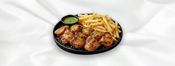 Chick Tik Bites and Chips — Grilled chicken breast pieces served with chips, GB Canteen Eastleigh
