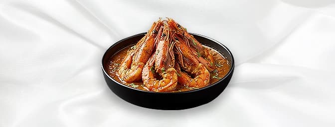 King Prawn Dhansak — Dhansak is a popular Indian dish, originating among the Parsi Zoroastrian community. It contains element