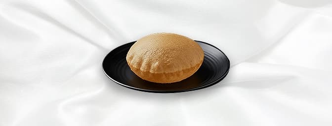 Poori — Fluffy fried breads made from wheat flour, GB Canteen Leamington Spa