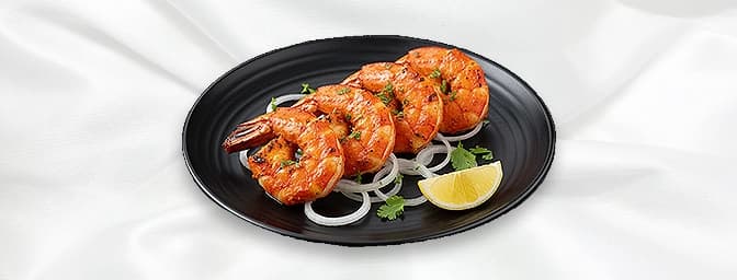 Tandoori King Prawn — King prawns marinated with herbs and spices, cooked in a traditional clay oven, GB Canteen Chingford