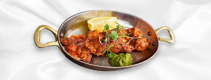 Chilli & Garlic Prawns — King prawns tossed in chilli and garlic with red chillies and finished with lemon, GB Canteen Greenf