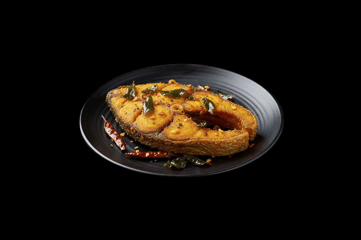 Fish Mixed Grill — Fresh rainbow trout, pomfret, King prawns, marinated in the Khas herbs and spices and barbecued in a clay 