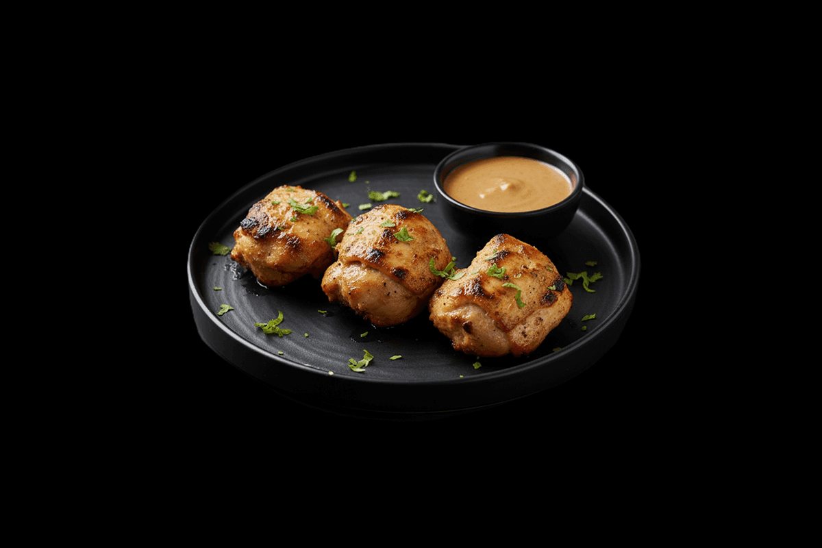 Black Pepper Chicken Tikka — Succulent chicken breast pieces in a rich black pepper and yoghurt marinade, GB Canteen Beaconsf