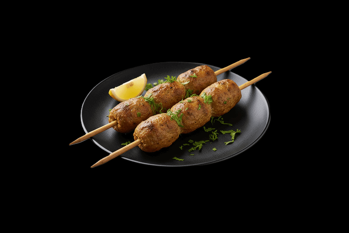 Reshmi Kebab — Minced lamb with special spices covered in an egg net, GB Canteen Bushey