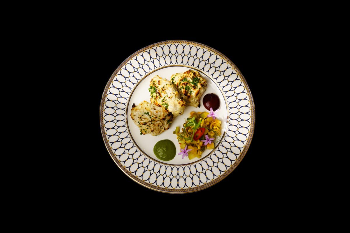 Malai Tikka — Charcoal grilled chicken pieces marinated with fresh green chillies, yoghurt, cheese and cream, GB Canteen Chan