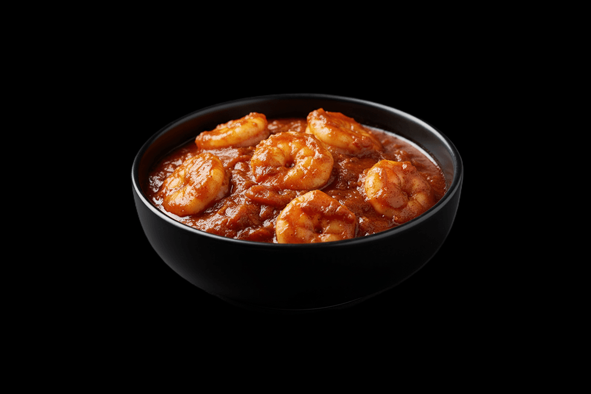 Prawn Patia — Prawns simmered in a hot, red sweet and sour curry sauce. Served with rice, GB Canteen Liss