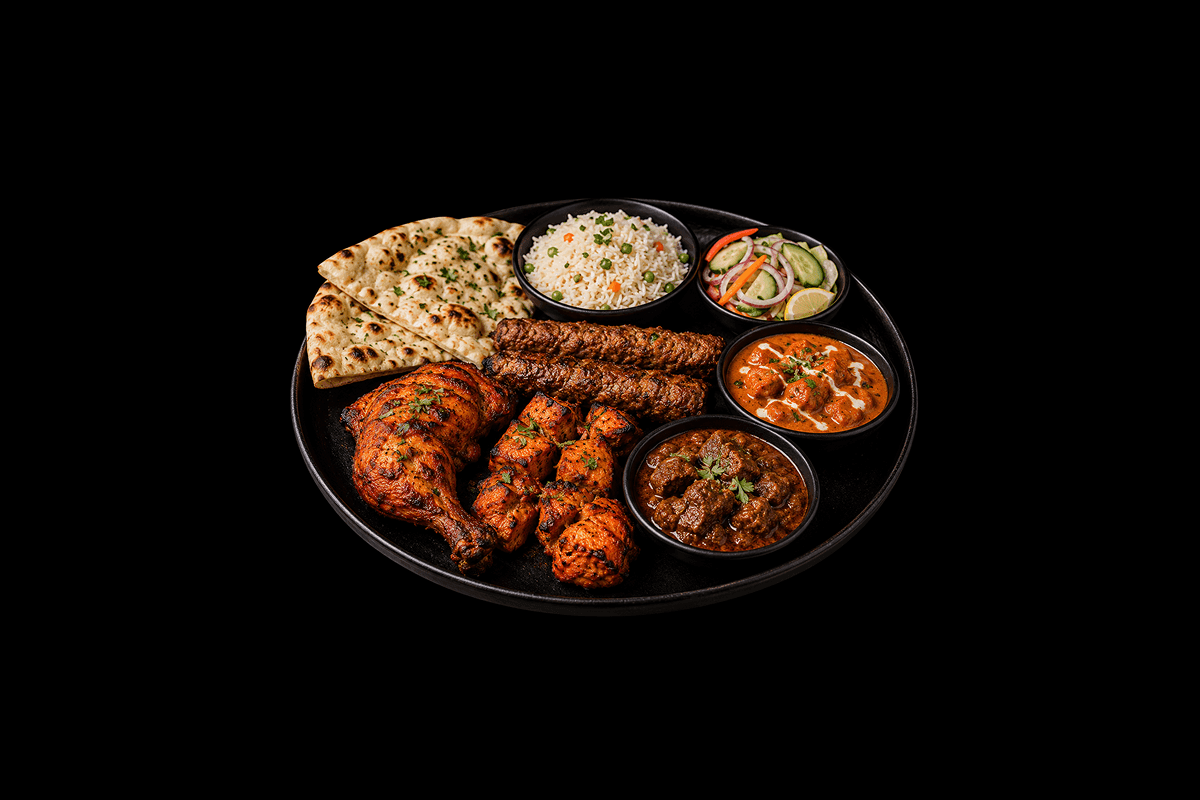 Meat Thali — Tandoori chicken, sheek kebab, chicken tikka, lamb bhuna, chicken tikka masala, fried rice, nan and salad, GB Ca