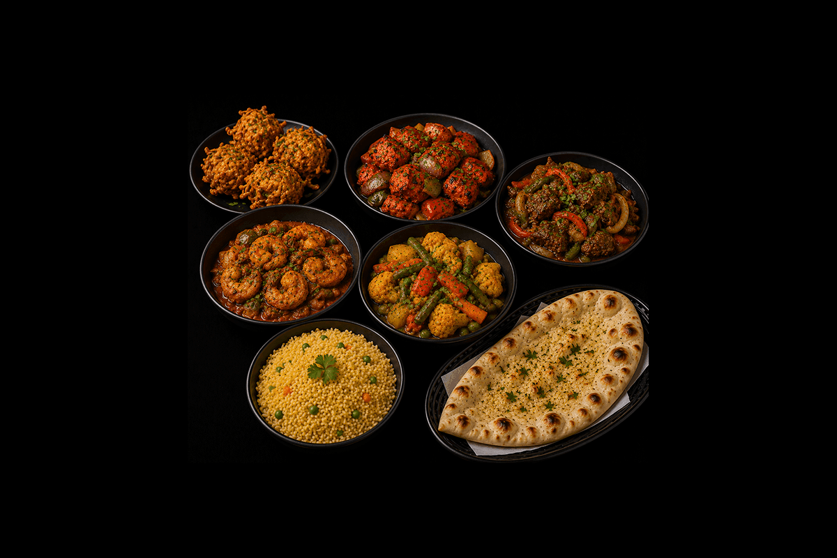 Mixed Thali — Onion bhaji, chicken tikka mossalla, lamb jalfrezi, prawn bhuna, shobji bahar, pilau rice & nan, GB Canteen Bus