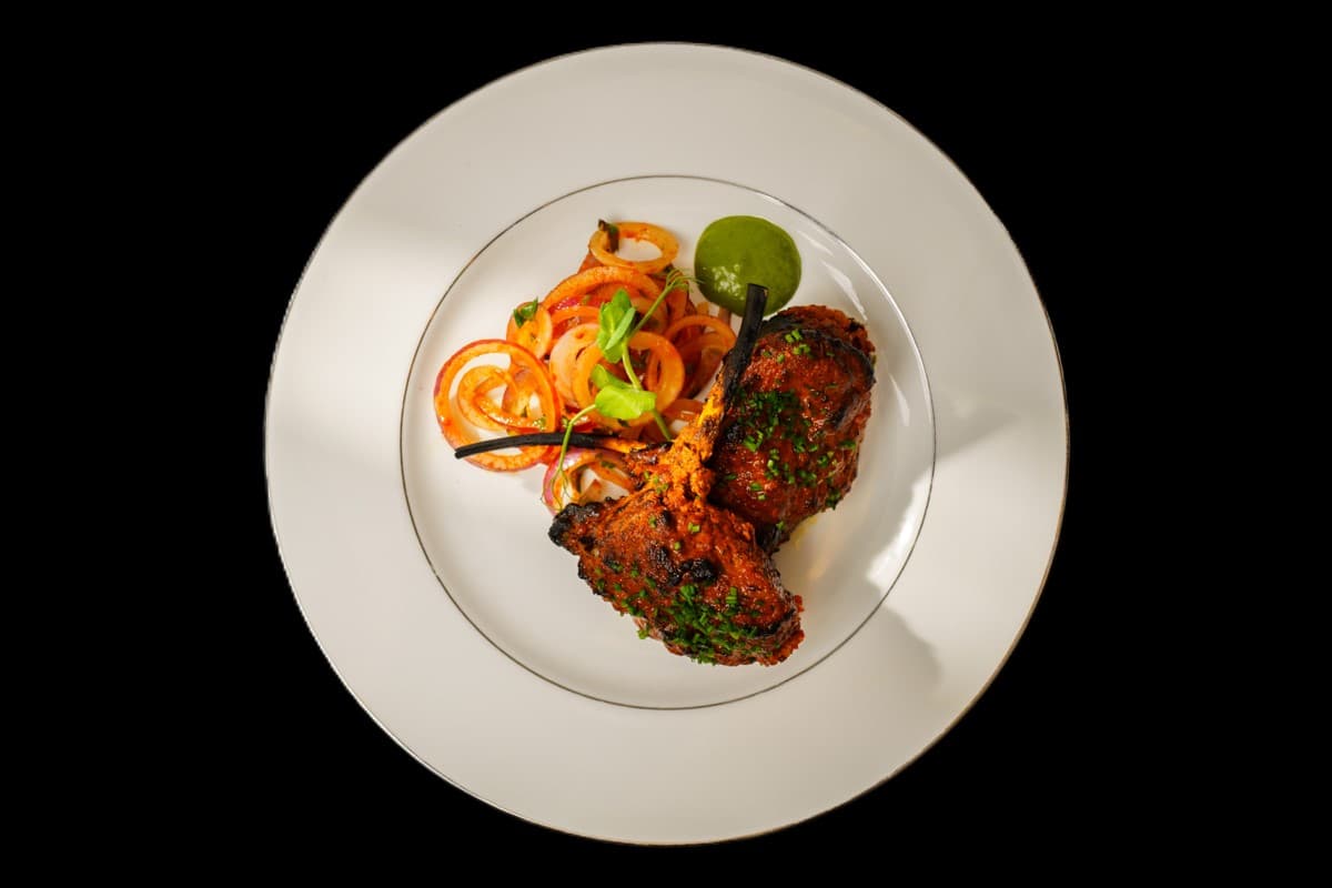 Nouka Ghost — Tandoori chef suggested that shredded lamb in a cucumber boat is a good combination accompanied with aloo chutn