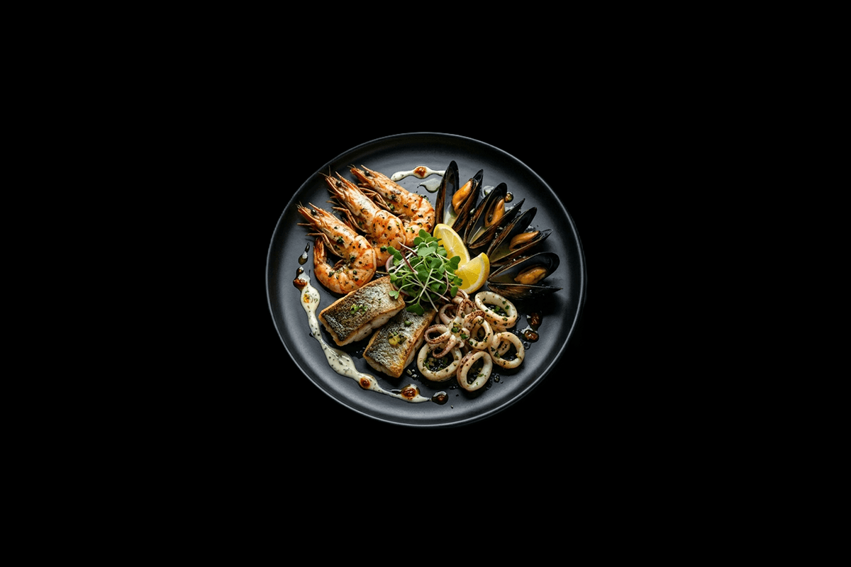 Seafood Mix — Different style of cooking with seafood, tandoori king prawn, salmon and fish kofta, a good texture, served wit