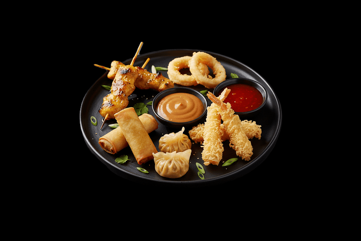 Mixed Platter — Chicken Satay, Calamari, Prawn Tempura, Vegetable Spring Rolls & Dim Sum served with peanut & sweet chilli sa