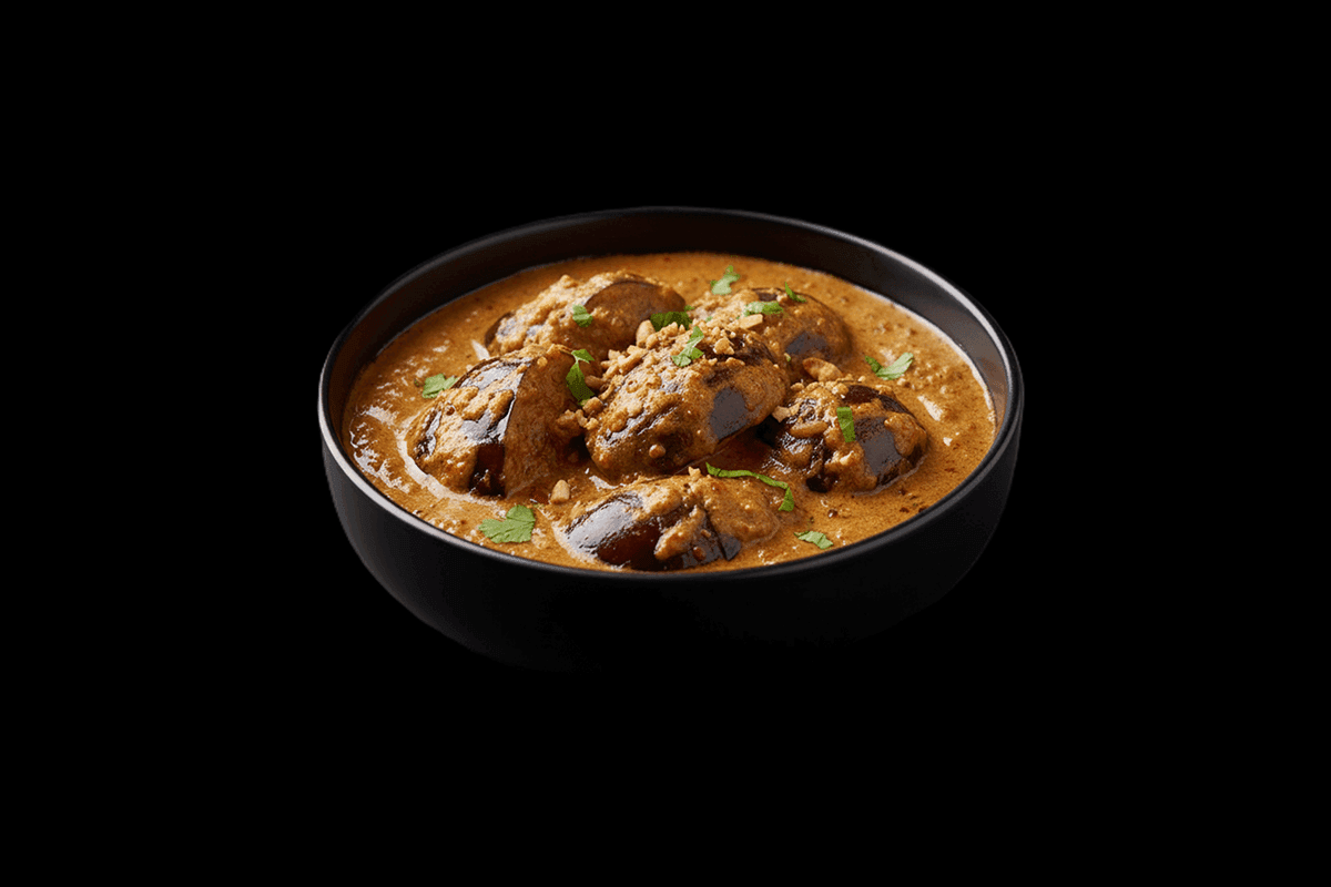 Kathrika Koottan — Aubergines cooked in a paste of coriander seeds, roasted onions, chillies mixed with cashew nut sauce, GB 