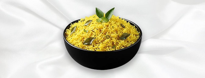 Naranga Choru — Tangy, fresh tasting rice tossed with lemon juice, fresh curry leaves, mustard seeds and dried red chillies, 