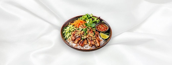 Vietnamese Noodles — Traditional Vietnamese dish served with vermicelli noodles, homemade sauce, carrot, cucumber & lettuce, 