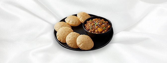 Poori Chana — Cassava marinated in turmeric & tossed with ginger, garlic and herbs, GB Canteen Tottenham