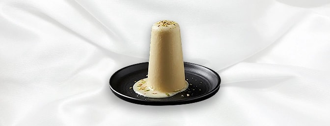 Kulfi — Kulfi: Creamy and indulgent, kulfi, a traditional frozen dessert that concludes your meal on a sweet note, GB Canteen