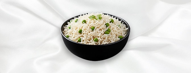 Peas Pulao — Fragrant basmati rice. Elevated with gently sauted peas and cooked to a light and fluffy consistency, GB Canteen