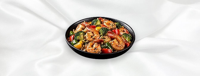 Prawn Teppan Yaki — Cooked with herbs, broccoli, green and red peppers over the hot sizzling platter, GB Canteen Harrow