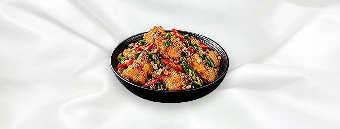 Salt and Pepper Fish — Crispy batter fried fish, tossed with green and red chillies, burnt garlic and crushed aromatic black 