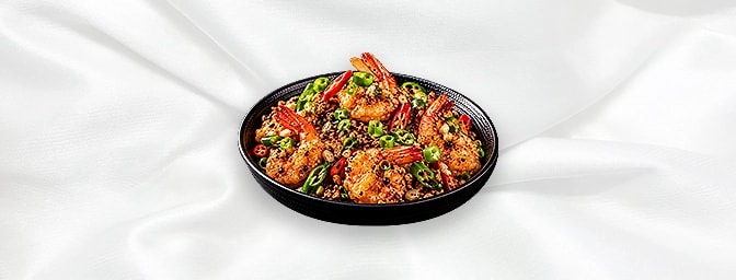 Santung Prawn — Crispy batter fried prawns, tossed with chopped green chillies, burnt garlic, crushed black pepper and finish