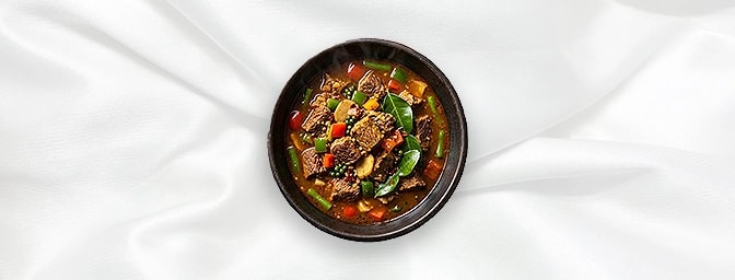Beef Jungle Curry — One of the four curries from the forest regions of Northern Thailand without any coconut milk; cooked wit