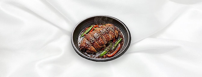Duck with Tamarind — Crispy Roast Duck with tamarind sauce and a sesame seed garnish, GB Canteen Newington