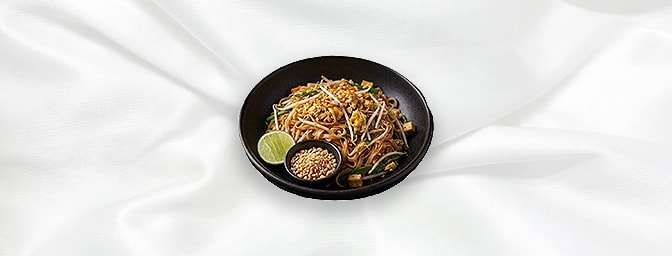 Pad Thai Noodles — A very traditional Thai stir-fried noodles with bean sprouts & egg � served on the side with a bowl of cru