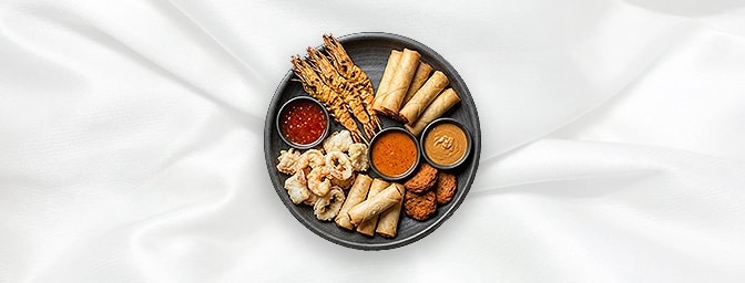 Platter Seafood — Sa-Tay King Prawns, Prawn spring rolls, Thai fish cakes, Crab Spring Rolls, Mixed Seafood Tempura � all ser