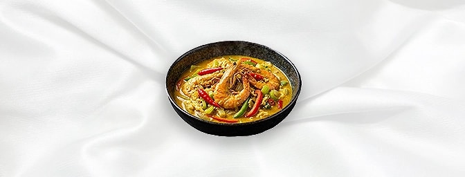 Prawn Pad Pongalee — Yellow curry paste cooked with milk, garlic, red chillies, oyster sauce, egg, peppers, celery & onions, 