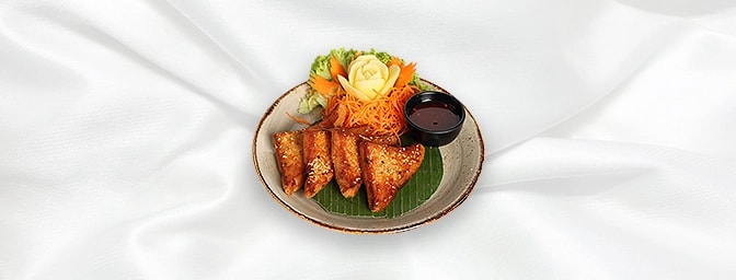 Prawns & Chicken on Toast — Marinated minced Chicken & Prawns with Thai herbs, topped with sesame seeds � served on toast wit