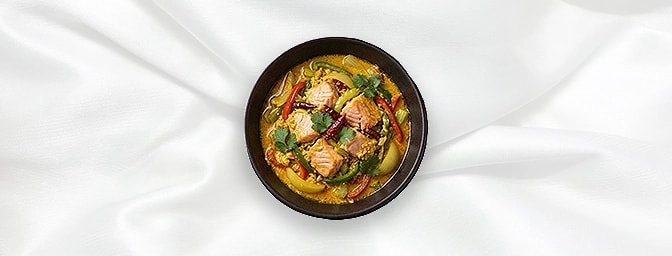 Salmon Pad Pongalee — Yellow curry paste cooked with milk, garlic, red chillies, oyster sauce, egg, peppers, celery & onions,