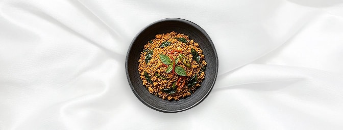 Thai Jollof Rice — Stir-fried rice with spicy minced Chicken, red curry paste, Thai basil & Thai herbs, GB Canteen Newington