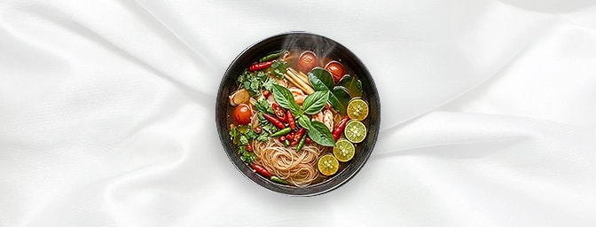 Tom Yum Noodle Soup — Hot & Sour clear soup served with thin noodles and fragrant Thai herbs, GB Canteen Newington