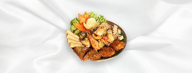 Platter Vegetarian — Vegetable spring rolls, corn cakes, Deep fried To-Fu, Vegetable Tempura and Monk's Vegetable on toast � 
