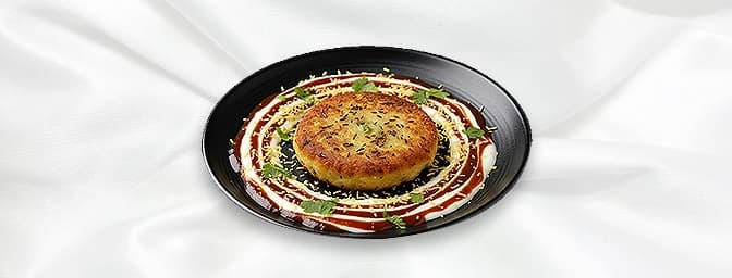 Aloo Tikki — Stuffed potato patties, cheese, spiced white peas, chutneys, GB Canteen Dulwich Indian