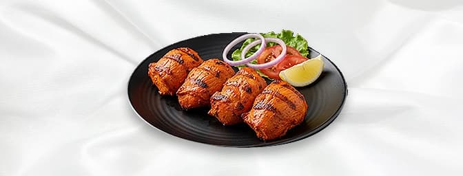 Duck Tikka — Duck marinated in herbs and spices, grilled in the clay oven, GB Canteen East Molesey