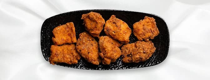 Fish Pakora — 8 pieces. A Haweli special fish pakora coated in our homemade Haweli batter, GB Canteen Southall