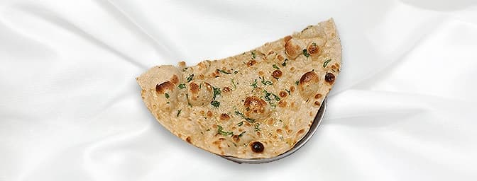 Garlic Naan — Fresh naan baked to pair with curries and grills, GB Canteen Watford