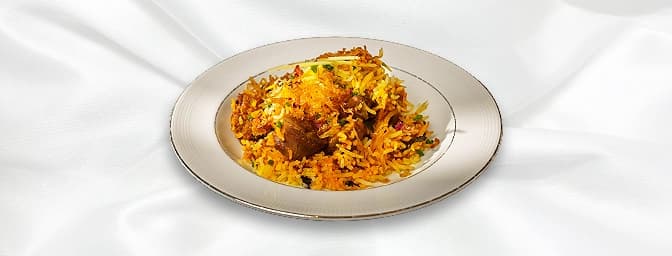 Lamb Biryani — Made from special flavoured basmati rice. Served with medium vegetable curry, GB Canteen Farnham
