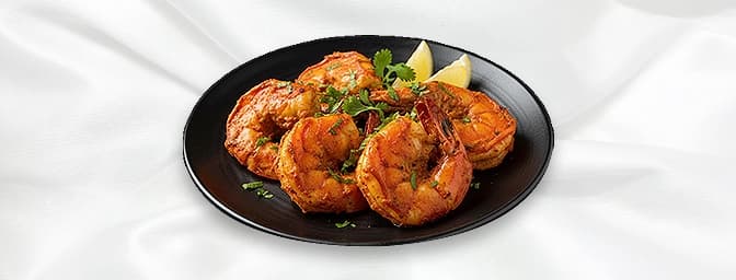 Pani Paath — Tiger prawns, marinated with turmeric and herbs, GB Canteen Chingford