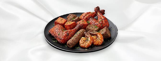 Mixed Starter — An assortment of lamb tikka, chicken tikka, onion bhaji, sheek kebab with delicate spices, GB Canteen Chingfo