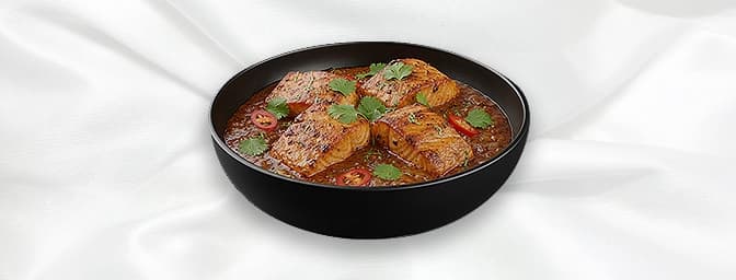 Salmon Rushni — Tandoori salmon cooked in a medium spiced bhuna sauce, GB Canteen East Molesey