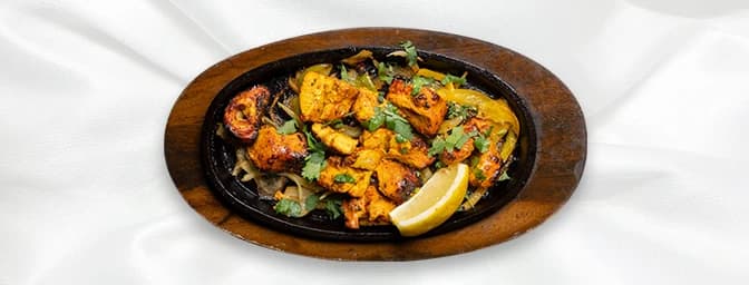 Lamb Tikka — Diced lamb marinated with roasted garam flour, caraway seeds, skewered with diced vegetables, GB Canteen Chandle