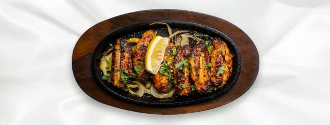 Chicken Wings — Spiced, marinated chicken wings, grilled or fried to a crispy finish, GB Canteen Walthamstow
