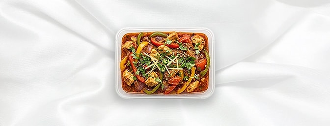 Chicken Jalfrezi — A vibrant, stir-fried masterpiece featuring tender chicken tossed with crunchy bell peppers and onions in