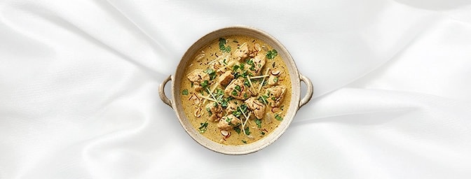 Chicken Korma — Experience the regal flavors of our Chicken Korma. Tender chicken simmered in a velvety, cashew-enriched sauc
