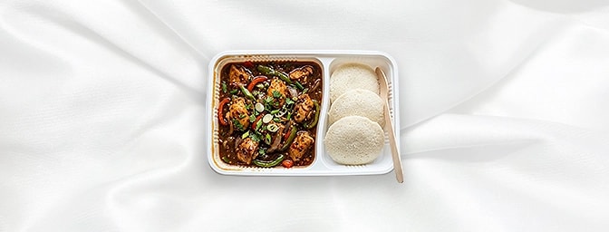 Chlli Chicken with Idli — Experience an Indian soul food fusion. Our spicy, stir-fried boneless chicken provides a robust kic